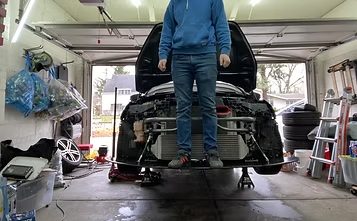 Standing on the splitter to demonstrate strength